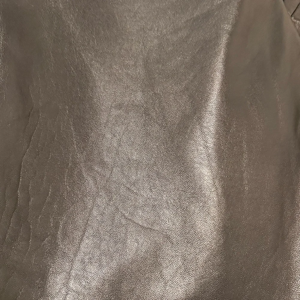 Valerie Steven’s Lambskin New Zealand leather straight leg high waisted pants